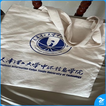 提袋 340*400mm，无底无侧，加宽织带和长飘带，长飘带印刷，一面带飘带。加磁扣，袋子右下图案单面印刷